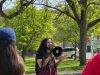 Trump education secretary foes, friends demonstrate during visit