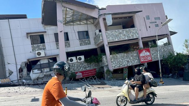 A 7.8 magnitude quake in the Philippines kills at least 32, collapses buildings and sparks tsunami
