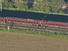 Two-train crash leaves 1 dead, 89 injured as emergency crews rush to chaotic scene